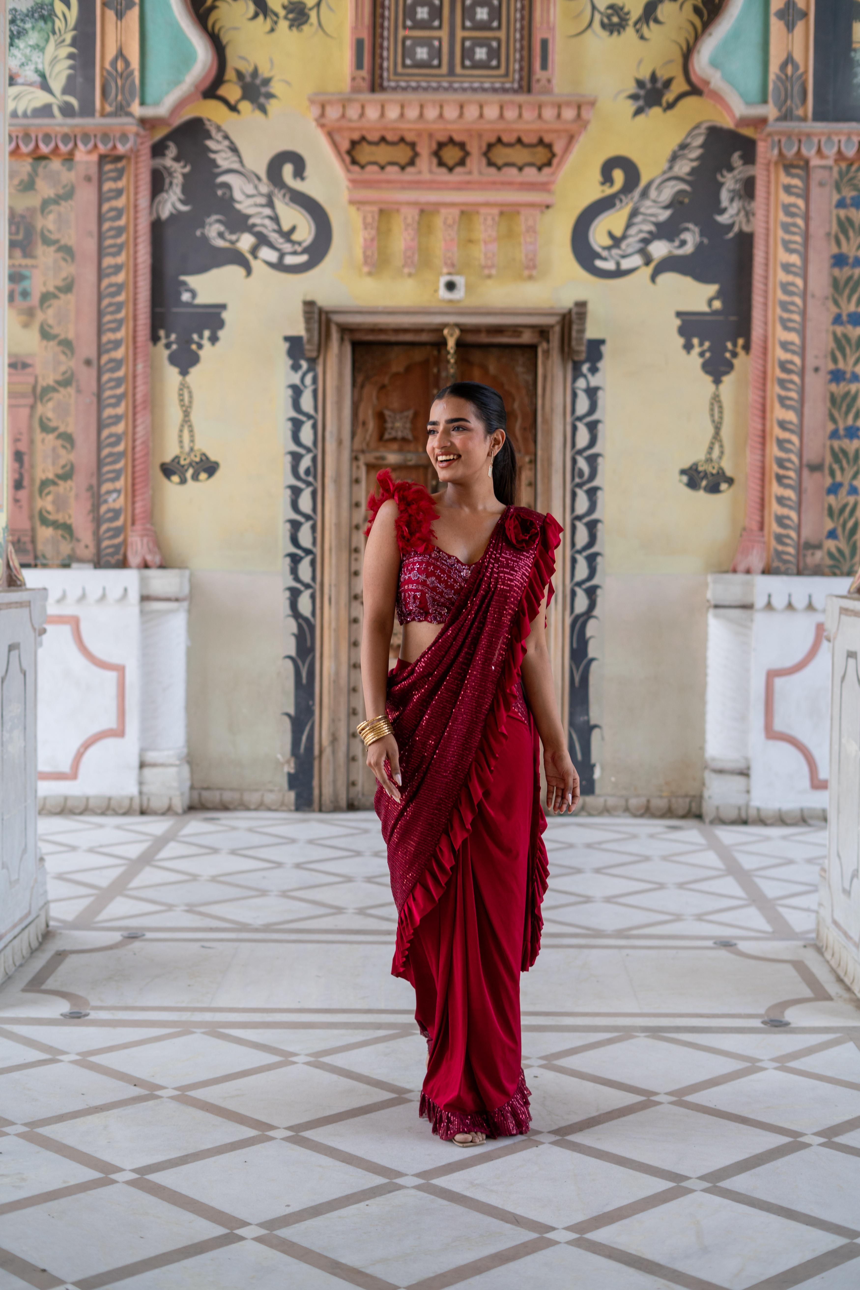 Crimson Red Ruffle Draped Saree with Feather Blouse!