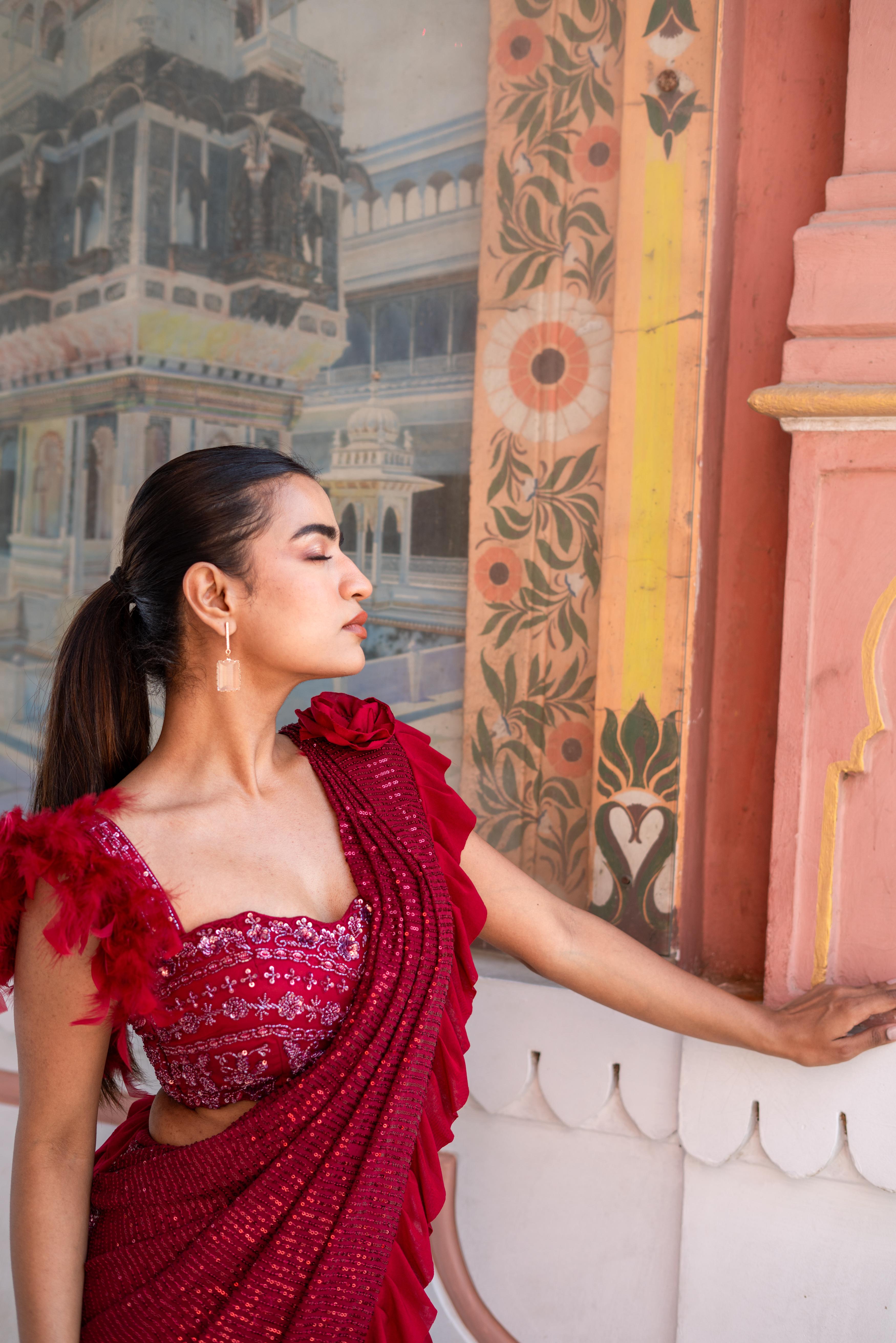 Crimson Red Ruffle Draped Saree with Feather Blouse!